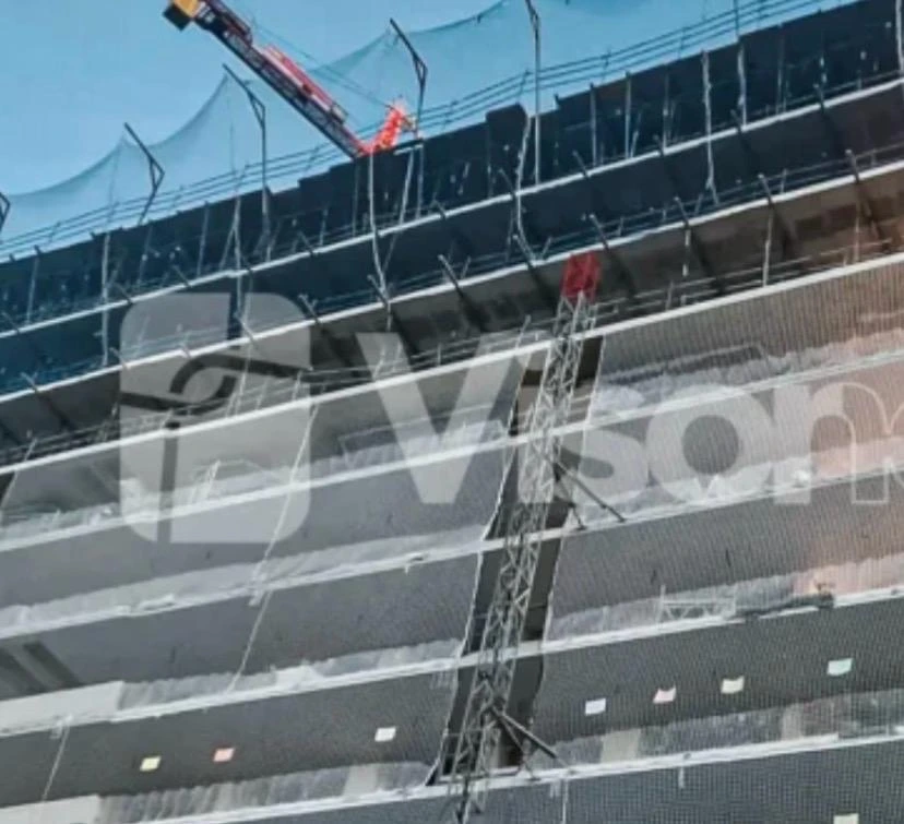 Redes verticales de seguridad en edificio en construcción